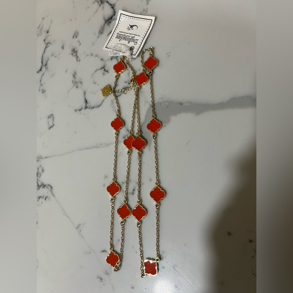 Long gold and orange necklace